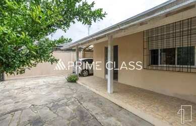 Imagem: A casa possui 3 Dormitórios, 3 Banheiros, 3 Vagas na garagem