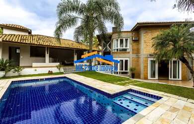 Imagem: A casa em condomínio possui 4 Dormitórios, 5 Banheiros, 5