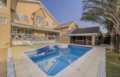 Imagem: A casa em condomínio possui 3 Dormitórios, 4 Banheiros, 5