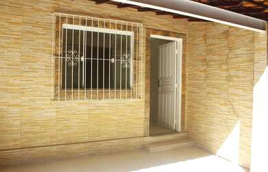 Imagem: A casa possui 2 Dormitórios, 2 Banheiros, 1 Vaga na garagem