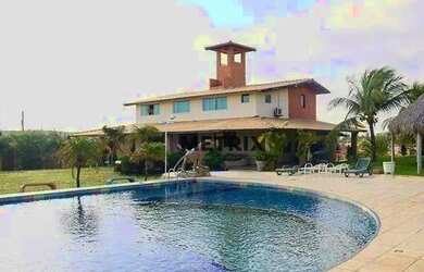 Imagem: A casa possui 5 Dormitórios, 5 Banheiros, 5 Vagas na garagem