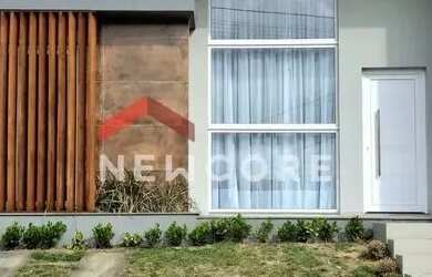 Imagem: A casa possui 3 Dormitórios, 2 Banheiros, 2 Vagas na garagem