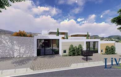 Imagem: A casa possui 3 Dormitórios, 3 Banheiros, 2 Vagas na garagem