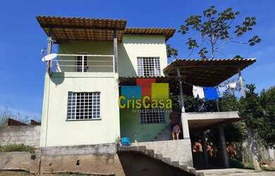 Imagem: A casa possui 2 Dormitórios, 2 Banheiros, 4 Vagas na garagem