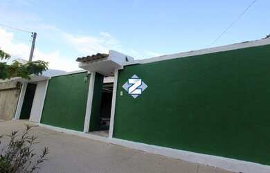 Imagem: A casa possui 3 Dormitórios, 3 Banheiros e 2 Vagas na garagem