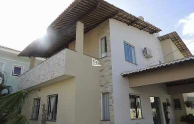 Imagem: A casa possui 4 Dormitórios, 5 Banheiros, 4 Vagas na garagem