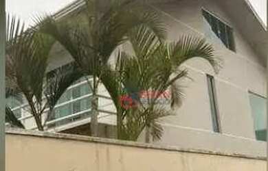 Imagem: A casa em condomínio possui 4 Dormitórios, 5 Banheiros, 4