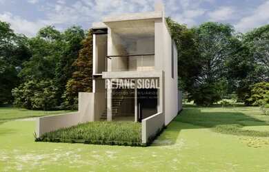 Imagem: A casa possui 3 Dormitórios, 1 Banheiro, 2 Vagas na garagem