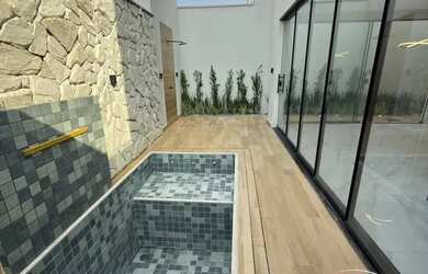 Imagem: A casa em condomínio possui 4 Dormitórios, 5 Banheiros, 2