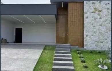 Imagem: A casa possui 4 Dormitórios, 5 Banheiros, 4 Vagas na garagem