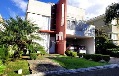 Imagem: A casa possui 3 Dormitórios, 3 Banheiros, 4 Vagas na garagem