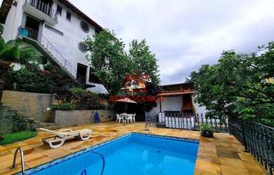 Imagem: A casa para alugar possui 3 Dormitórios, 4 Banheiros, 2 Vagas