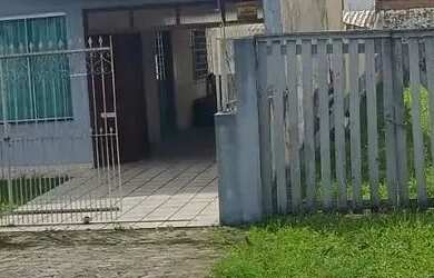 Imagem: A casa possui 3 Dormitórios, 3 Banheiros, 2 Vagas na garagem