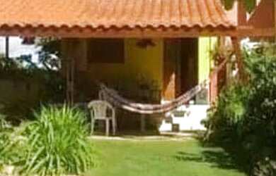 Imagem: A casa possui 4 Dormitórios, 3 Vagas na garagem e está localizado