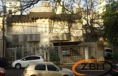 Imagem: A casa possui 5 Dormitórios, 5 Banheiros, 4 Vagas na garagem