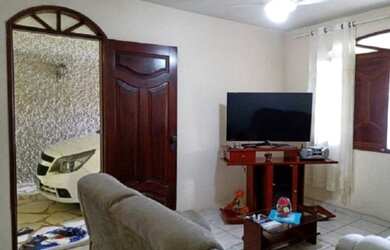 Imagem: A casa possui 3 Dormitórios, 2 Banheiros, 2 Vagas na garagem