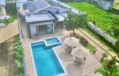 Imagem: A casa possui 5 Dormitórios, 5 Banheiros, 4 Vagas na garagem