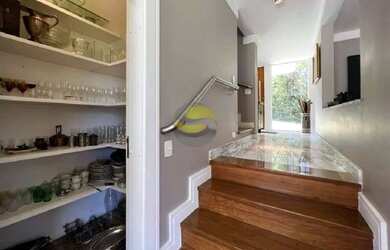 Imagem: A casa em condomínio possui 4 Dormitórios, 5 Banheiros, 5