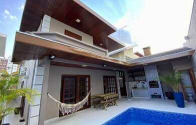 Imagem: A casa em condomínio possui 3 Dormitórios, 4 Banheiros, 2