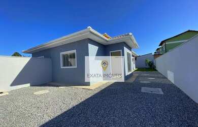 Imagem: A casa possui 3 Dormitórios, 2 Banheiros, 3 Vagas na garagem