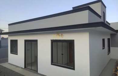 Imagem: A casa possui 3 Dormitórios, 2 Banheiros, 2 Vagas na garagem