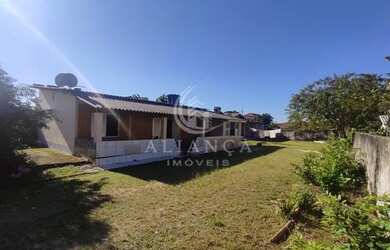 Imagem: A casa possui 2 Dormitórios, 2 Banheiros, 70m² de Área e