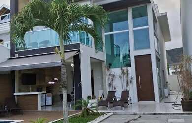 Imagem: A casa em condomínio possui 5 Dormitórios, 5 Banheiros, 2