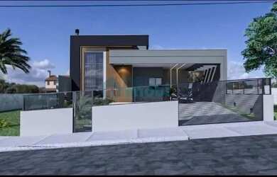 Imagem: A casa possui 3 Dormitórios, 3 Banheiros, 2 Vagas na garagem