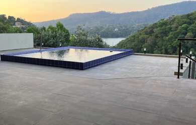 Imagem: A casa em condomínio possui 4 Dormitórios, 5 Banheiros, 4