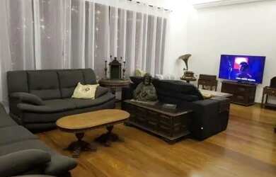 Imagem: A casa possui 5 Dormitórios, 5 Banheiros, 5 Vagas na garagem