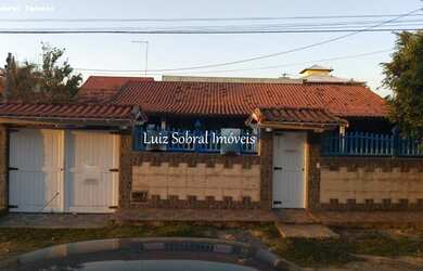 Imagem: A casa possui 2 Dormitórios, 3 Banheiros, 2 Vagas na garagem