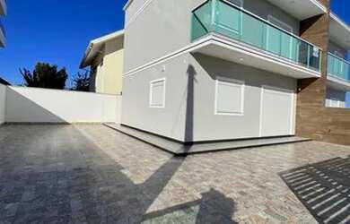 Imagem: A casa possui 3 Dormitórios, 2 Banheiros, 3 Vagas na garagem