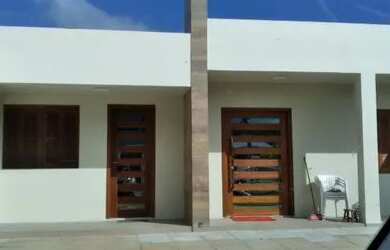 Imagem: A casa possui 3 Dormitórios, 4 Vagas na garagem e está localizado