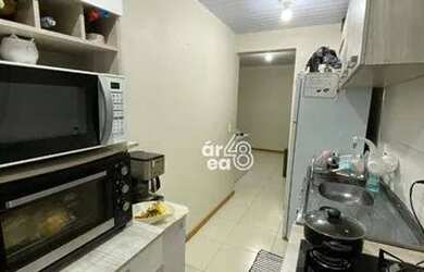 Imagem: O apartamento possui 2 Dormitórios, 1 Banheiro, 1 Vaga na garagem