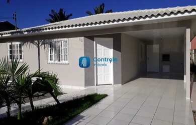 Imagem: A casa possui 4 Dormitórios, 3 Banheiros, 2 Vagas na garagem