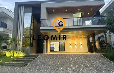 Imagem: A casa possui 4 Dormitórios, 5 Banheiros, 3 Vagas na garagem