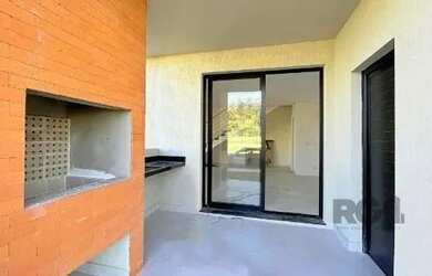 Imagem 15: Casa em Porto Alegre, no bairro Hípica, com 3 dormitório s , e 3 banheiros,...