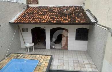 Imagem: A casa possui 3 Dormitórios, 3 Banheiros, 1 Vaga na garagem