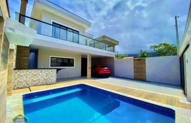 Imagem: A casa possui 3 Dormitórios, 5 Banheiros, 5 Vagas na garagem