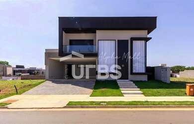 Imagem: A casa em condomínio possui 4 Dormitórios, 5 Banheiros, 4