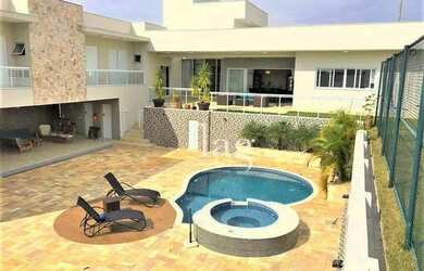 Imagem: A casa em condomínio possui 4 Dormitórios, 5 Banheiros, 5