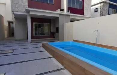 Imagem: A casa possui 3 Dormitórios, 4 Banheiros, 3 Vagas na garagem