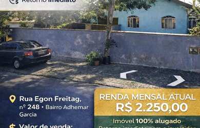 Imagem: A casa possui 4 Dormitórios, 2 Banheiros, 2 Vagas na garagem