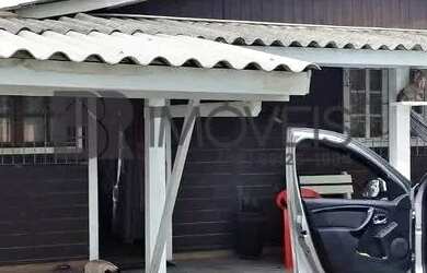 Imagem: A casa possui 2 Dormitórios, 1 Banheiro, 1 Vaga na garagem