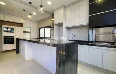 Imagem: A casa em condomínio possui 4 Dormitórios, 5 Banheiros, 4