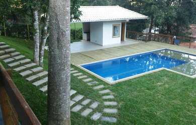 Imagem: A casa em condomínio possui 4 Dormitórios, 5 Banheiros, 5