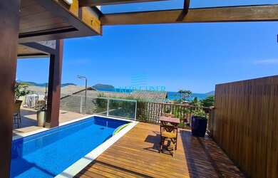 Imagem: A casa em condomínio possui 4 Dormitórios, 4 Banheiros, 2