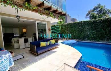 Imagem: A casa em condomínio possui 4 Dormitórios, 5 Banheiros, 2