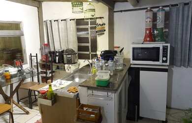 Imagem: A casa possui 2 Dormitórios, 3 Banheiros e está localizado