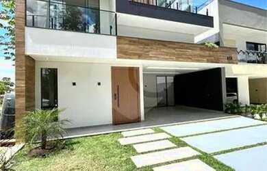 Imagem: A casa possui 4 Dormitórios, 5 Banheiros, 2 Vagas na garagem